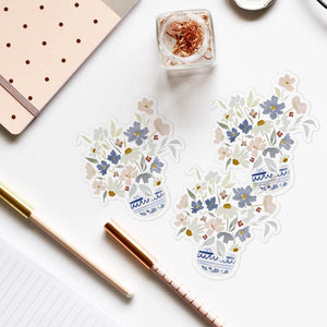 Pretty stickers of florals in a blue and white vase.